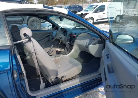 1999 Ford Mustang z USA, uszkodzony, nr VIN 1FAFP4440XF134238